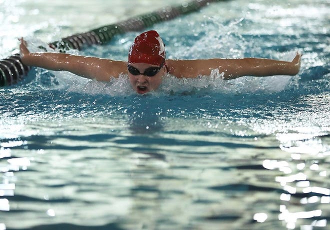 Hingham's Katherine Connolly competes in the 100 yard butterfly in their meet against Hanover at the Percy Walker Pool on Thursday, Jan. 25, 2018. [Wicked Local Staff Photo/ Robin Chan]