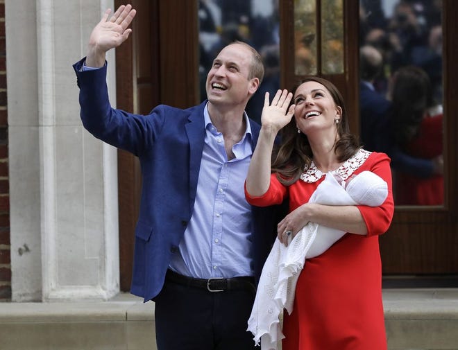 Britain's Prince William and Kate, Duchess of Cambridge wave holding their newborn baby son as they leave the Lindo wing at St Mary's Hospital in London London, Monday, April 23, 2018. The Duchess of Cambridge gave birth Monday to a healthy baby boy ó a third child for Kate and Prince William and fifth in line to the British throne. (AP Photo/Kirsty Wigglesworth)