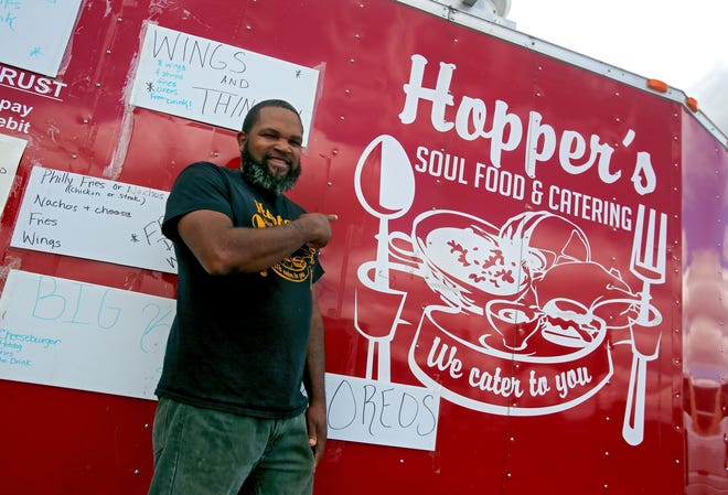 Shontrell Hopper’s soul food truck offers a variety of food at the new Boost Mobile location in Shelby. [Brittany Randolph/The Star]