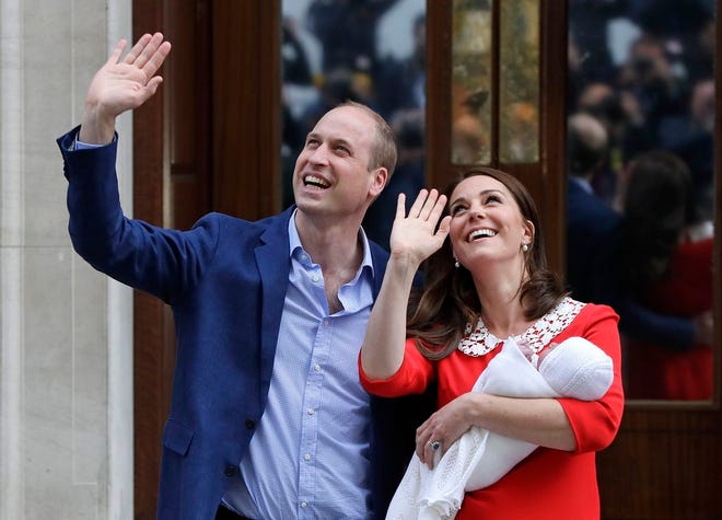Britain's Prince William and Kate, Duchess of Cambridge wave holding their newborn baby son as they leave the Lindo wing at St Mary's Hospital in London London, Monday, April 23, 2018. The Duchess of Cambridge gave birth Monday to a healthy baby boy, a third child for Kate and Prince William and fifth in line to the British throne. (AP Photo/Kirsty Wigglesworth)