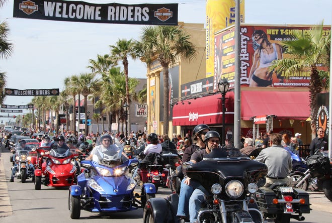 A endless stream of bikers roll down Main Street in Daytona Beach during Bike Week 2018 in Daytona Beach Saturday March 10, 2018. [News-Journal/Jim Tiller]