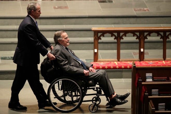 Former Presidents George W. Bush, left, and George H.W. Bush arrive at St. Martin's Episcopal Church for a funeral service for former first lady Barbara Bush, Saturday, April 21, 2018, in Houston. (AP Photo/David J. Phillip )
