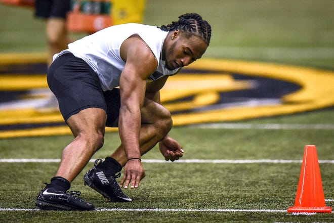 Missouri safety Anthony Sherrils runs a drill during the Tigers' pro day at Devine Pavilion on March 22. Some draft experts believe Sherrils has the size and speed to be an NFL defensive back. [Hunter Dyke/Tribune]