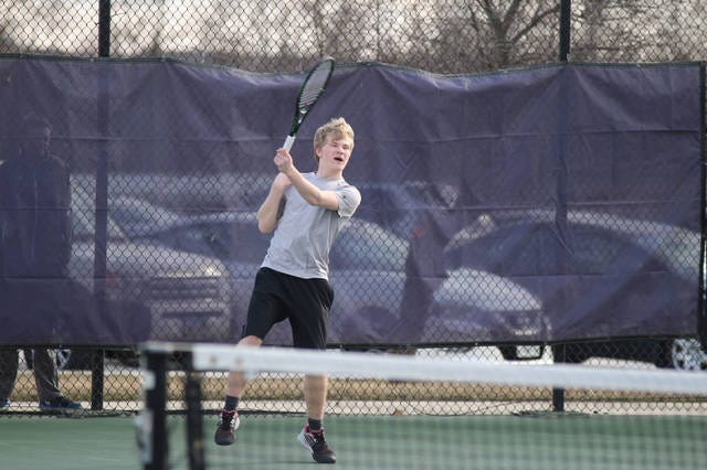 Waukee senior Nick Weyers handles an opponents serve during their opening match of the season on Friday, March 30th. PHOTO BY ANDREW BROWN/DALLAS COUNTY NEWS