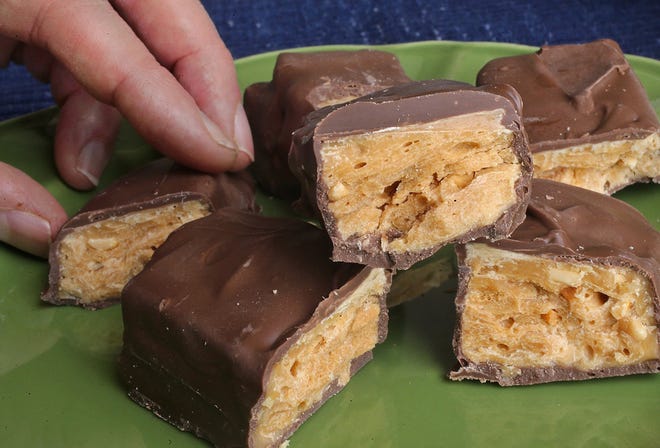 Nutterfinger is a knockoff candy bar with a crunchy center. [TRIBUNE NEWS SERVICE]