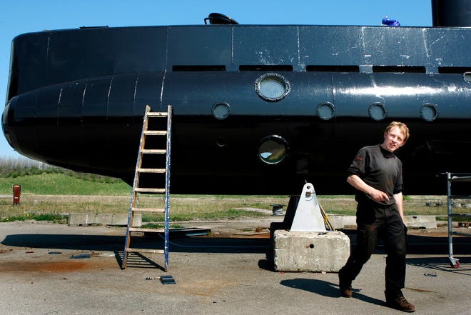 This April 30, 2008 file photo shows a submarine and its owner Peter Madsen. One of the most talked-about and macabre court cases in recent Danish history concluded Wednesday, April 25, 2018, a jury convicted Madsen of torturing and murdering Swedish journalist Kim Wall during a private submarine trip.