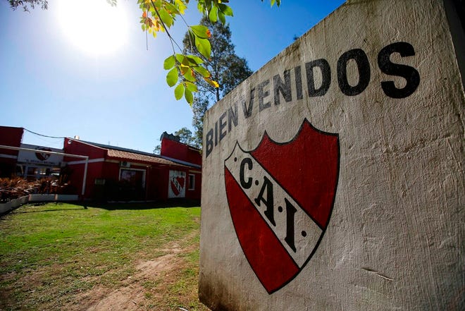 This April 14, 2018 photo, shows the entrance to the youth complex of Independiente soccer club, on the outskirts of Buenos Aires, Argentina. Investigators say that at least 10 minors were prostituted and several other more minors are believed to have been potential victims at the club's youth section. Six men, including a referee, have been arrested in the child prostitution ring at Independiente. (AP Photo/Luciano Matteazzi)