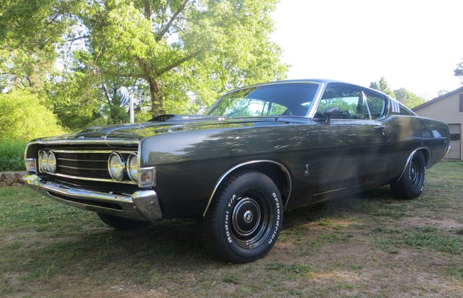 A 1969 Ford Torino has been restored and will make its first public appearance on Saturday at the 11th Annual Classics in the Country Car Show in Oconee County. [Wayne Ford/staff]