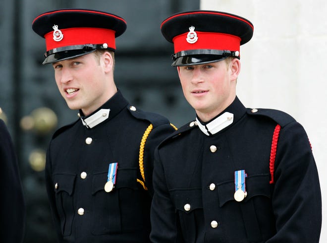 In this Wednesday April 12, 2006 file photo, Britain's Prince William, left, and Prince Harry attend The Sovereign's Parade at the Royal Military Academy at Sandhurst, England. Britain's royal officials said Thursday April 26, 2018, Prince Harry has asked elder brother Prince William to be best man at his wedding when he marries U.S. actress Meghan Markle at Windsor Castle on May 19.