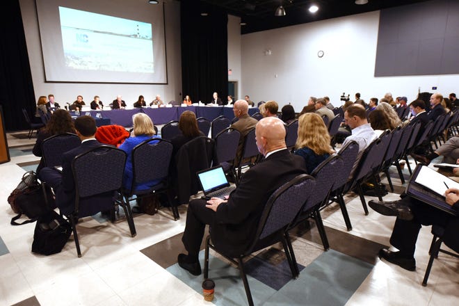 The crowd listens during the N.C. Science Advisory Board meeting at UNCW on Dec. 4, 2017. Participants were discussing health studies, GenX and other emerging chemicals. [STARNEWS FILE PHOTO]