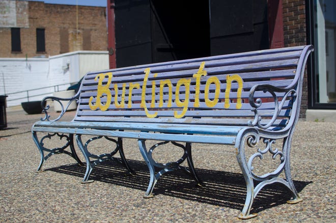 A local favorite bench produced by Downtown Partners' County Seats program is shown. [Tanner Cole/thehawkeye.com]