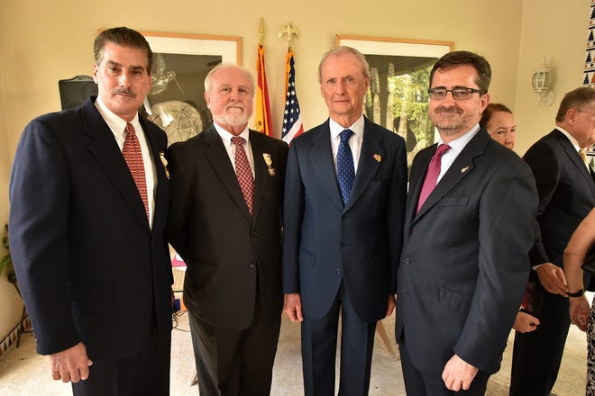 Dana Ste. Claire (from left), former director of St. Augustine's 450th anniversary department, and former St. Augustine Mayor Joe Boles stand with Spanish Ambassador Pedro Morenes and Spanish Consul General Candido Creis at a ceremony in February in Coral Gables. On behalf of Spain's King Felipe VI and Queen Letizia, Morenes presented the Cross of the Order of Isabella the Catholic to Boles and Ste. Claire for their roles in bringing about the city's 450th anniversary celebrations. [CONTRIBUTED]