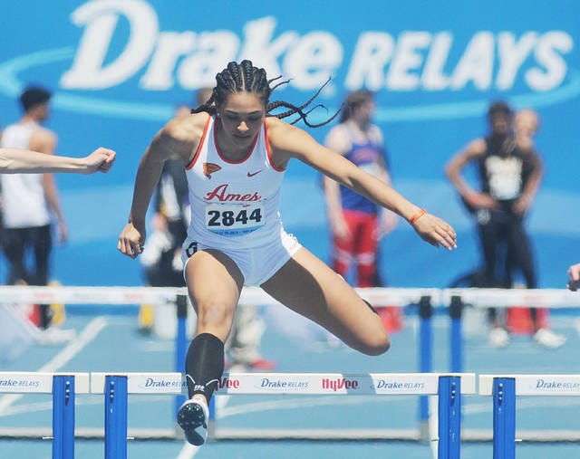 Ames’ Isabell Ingram goes over a hurdle during the high school girls’ 400-meter hurdles at the 109th Drake Relay at Drake Stadium on Saturday in Des Moines. Photo by Nirmalendu Majumdar/Ames Tribune