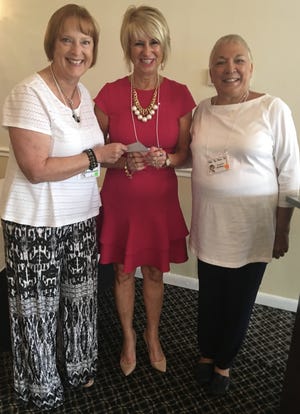 The Pelican Bay Women’s Club recently hosted a Spring Fashion Show at the Clubhouse of Pelican Bay. Proceeds from the event were delegated to Food Brings Hope with the goal of helping to eradicate youth hunger and homelessness in Volusia County. A $1,500 check was presented. Pictured from left, Laura Sandmark, vice president; Judi Winch, Food Brings Hope executive director and Jeannie McMillen, president. [Photo provided]