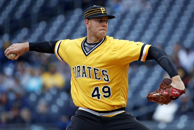 Pirates starting pitcher Nick Kingham delivers in the first inning of his first major league start Sunday in Pittsburgh. [Gene J. Puskar/The Associated Press]