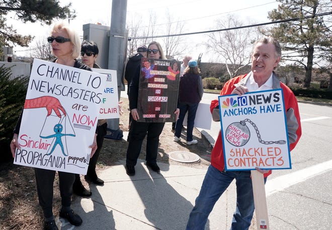 Members of the Free Speech Coalition picket outside the WJAR-TV studios in Cranston earlier this month to protest Sinclair Broadcasting Group's "must run" conservative commentaries. [The Providence Journal / Sandor Bodo]
