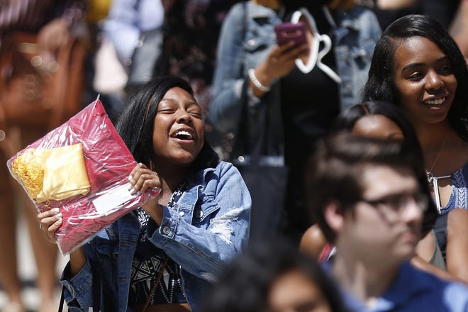 Seniors take part in the Senior Walk during "Glads Rise Up" recently at Clarke Central High School. [Joshua L. Jones/Athens Banner-Herald]