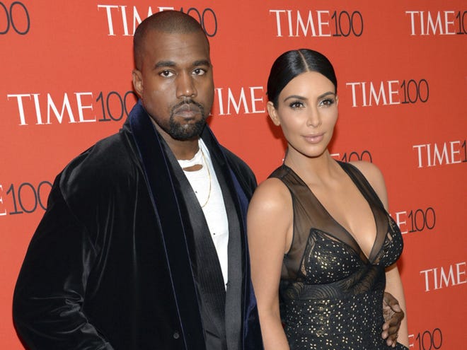 In this April 21, 2015 file photo, Kanye West and Kim Kardashian attend the TIME 100 Gala, in New York. (Evan Agostini/Invision/AP)