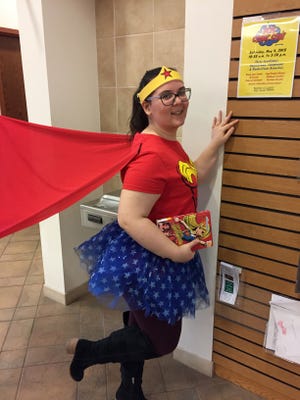 Quakertown Library Youth Services Librarian Nicole Savitsky is dressed as Wonder Woman in advance of Bucks County Free Library Comic Con to be held May 5. [Courtesy of Bucks County Free Library.]