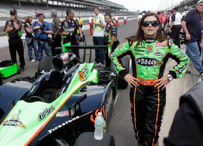 In this May 2010 photo, driver Danica Patrick waits to be interviewed after she qualifying at the Indianapolis 500 at Indianapolis Motor Speedway. Patrick's farewell tour begins its final phase on Tuesday when she gets back in an Indy car for the first time since 2011. [AP PHOTO/AJ MAST]