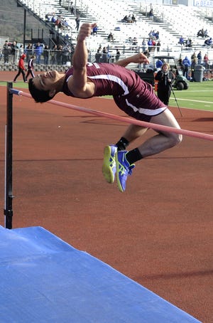 Stroudsburg's Edwin Ferreras clears the bar during the high jump at Pleasant Valley High School in Brodheadsville on Monday. Ferreras went on to win the event with a jump of 5-11. [KEITH R. STEVENSON/POCONO RECORD]