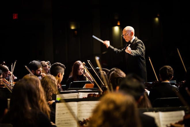 Walter Pavasaris conducts the Symphony Orchestra. [Courtesy Photo / Kathy Joyce]