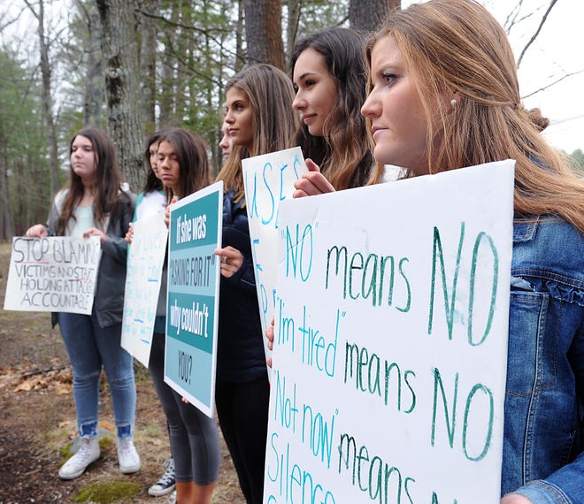 Lincoln-Sudbury Regional High School students spoke to the media after students walked out of school Monday morning protesting the district's response to an alleged sexual assault in 2013. At right is Katie Kohler. [Daily News and Wicked Local Staff Photo/Art Illman]
