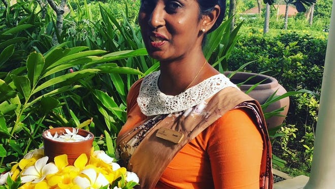 At Anantara Peace Haven Tangalle Resort, a welcome ritual involves a blessing, the language of flowers as prayer and beautiful traditional songs crooned by staff. Contributed by Becca Hensley