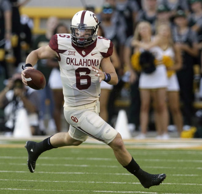 Oklahoma quarterback Baker Mayfield (6) runs against Baylor during the first half of a game Sept. 23, 2017 in Waco, Texas. (AP Photo/LM Otero)