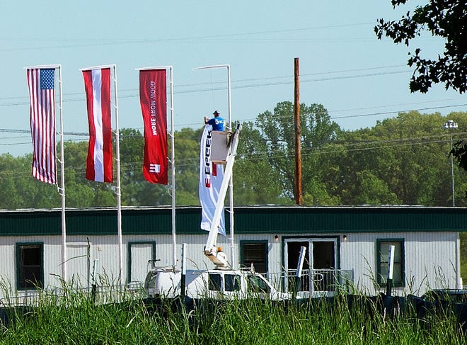An EGGER banner is raised Tuesday afternoon at an office structure in the new Davidson County Industrial Park off Belmont Road. [Donnie Roberts/The Dispatch]