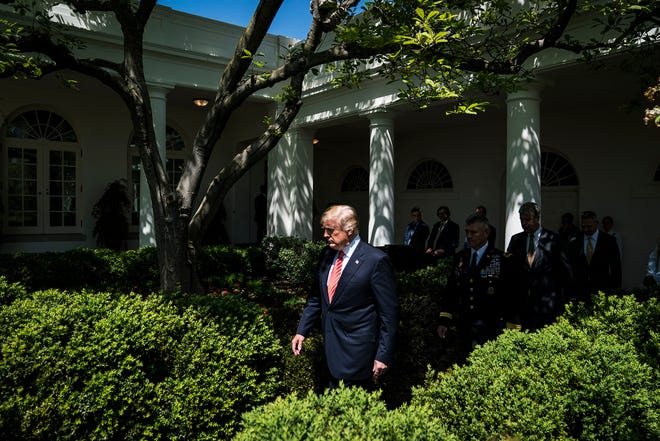 President Trump, seen walking out to the Rose Garden at the White House on Tuesday, has repeatedly decried the investigation as a "witch hunt." [Washington Post photo by Jabin Botsford]