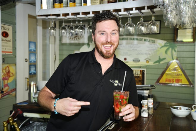 Shawn Baxter has been in the restaurant business for 17 years and said bartending is by far his favorite posistion in the industryl. "I've done it all from bussing to manageing, but bartending is a lot less stressful than being a manager, that's for sure!" he said. [SAVANNAH VASQUEZ/DAILY NEWS]