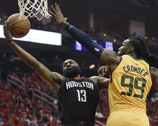 Houston Rockets guard James Harden, left, drives to the basket as Utah Jazz forward Jae Crowder defends during Game 1 of the NBA second round playoff in Houston. [AP PHOTO/ERIC CHRISTIAN SMITH]