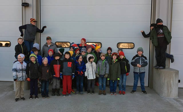 Local Scouts pose for a photo during their food drive. Contributed photo