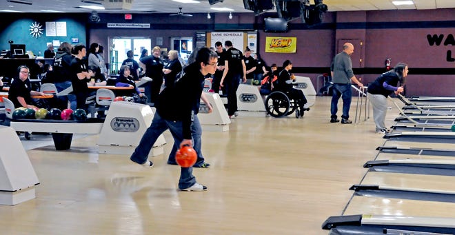 The first Wayne County bowl-a-thon Thursday at Wayne Lanes featured 101 students with special needs from 10 school districts (Dalton, Ida Sue, Northwestern, Norwayne, Orrville, Rittman, Smithville, Southeast, Triway and Wooster) and the Wayne County Career Center, as well as 42 adults. There also was a pizza lunch, awards and socializing. The highest scoring bowler of the event, Tyler Alfred of Norwayne, with a 148 game, was given a 4-foot trophy to display in his school until next year’s bowl-a-thon, which is planned to be an annual event. Each student bowled two games.