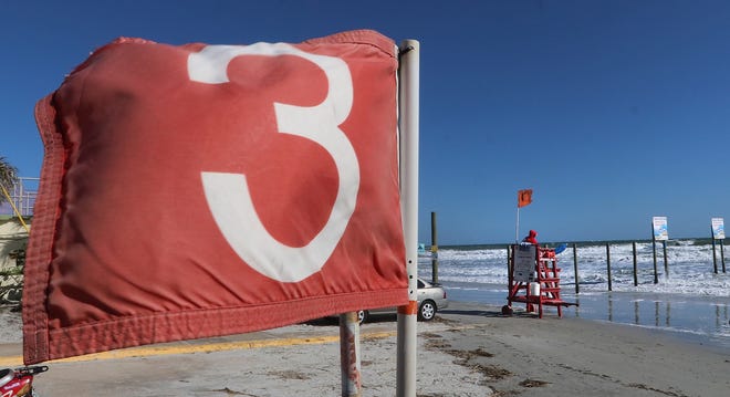 The red flag was out at the International Speedway approach warning bathers not to enter the surf as a high tide and rough surf made for a rough day at the beach Saturday morning March 3, 2018. [News-Journal/Jim Tiller]