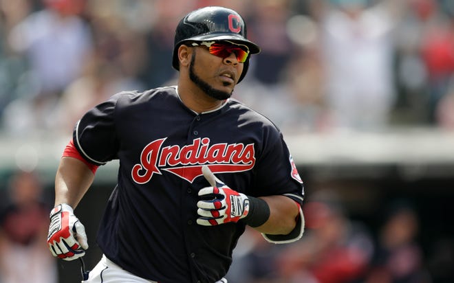Cleveland Indians' Edwin Encarnacion runs the bases after hitting a solo home run off Texas Rangers relief pitcher Jesse Chavez in the eighth inning of a baseball game, Wednesday, May 2, 2018, in Cleveland. The Indians won 12-4. (AP Photo/Tony Dejak)
