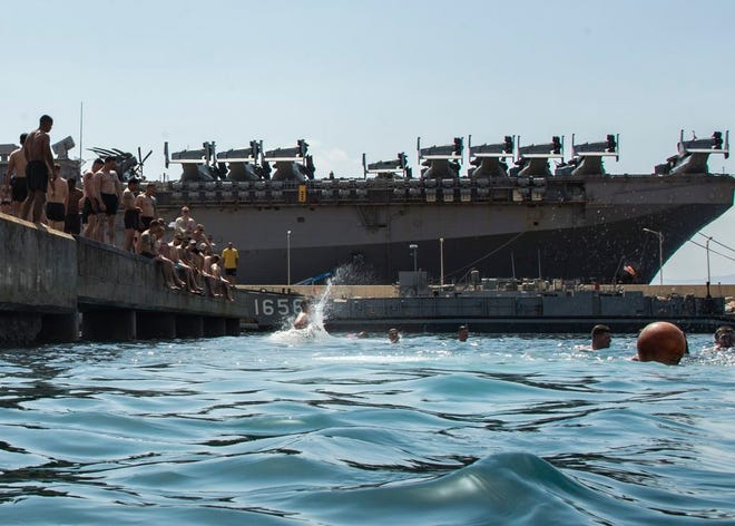 180428-N-ZG607-0136
AQABA, Jordan (April 28, 2018) Sailors and Marines deployed with the Wasp-class amphibious assault ship USS Iwo Jima (LHD 7) participate in a swim call in Aqaba, Jordan, April 28, 2018. Iwo Jima, homeported in Mayport, Fla., is on a regularly scheduled deployment to the U.S. 5th Fleet area of operations in support of maritime security operations to reassure allies and partners, and preserve the freedom of navigation and the free flow of commerce in the region. (U.S. Navy photo by Mass Communication Specialist Seaman Dominick A. Cremeans/Released)