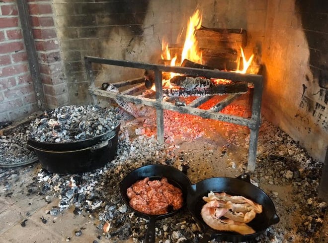 Cooking with cast-iron over hot coals takes time, but it’s worth the wait. [Jennie Geisler]