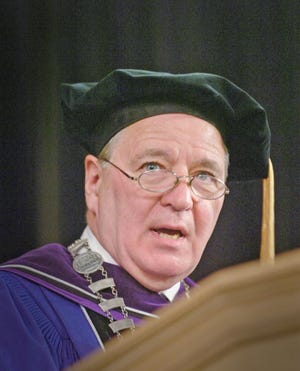 Peter Tsaffaras, president, gives an address the Quincy College graduation at the Marriott ballroom in Quincy, Saturday, May 19, 2012.



Photo: Amelia Kunhardt/The Patriot Ledger