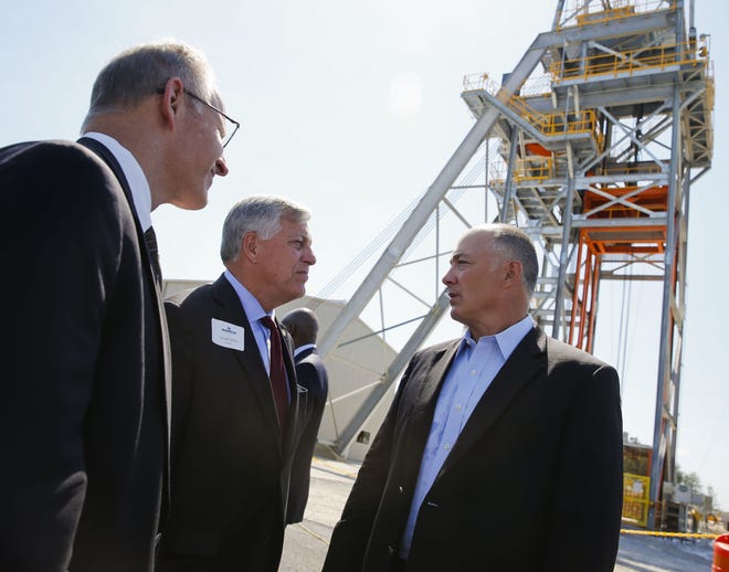 Warrior Met Coal celebrated the opening of a new mine portal at the 7 North Mine facility near Brookwood Wednesday, May, 2, 2018. Rich Wingo and Gerald Allen, members of the Tuscaloosa area delegation to Montgomery, speak with CEO Walt Scheller. [Gary Cosby Jr./Staff Photo]