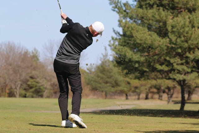 DC-G’s Derek Shanno teeing off from hole two during a triangular with Pella Christian and Oskaloosa on Tuesday, April 17th. PHOTO BY ANDREW BROWN/DALLAS COUNTY NEWS