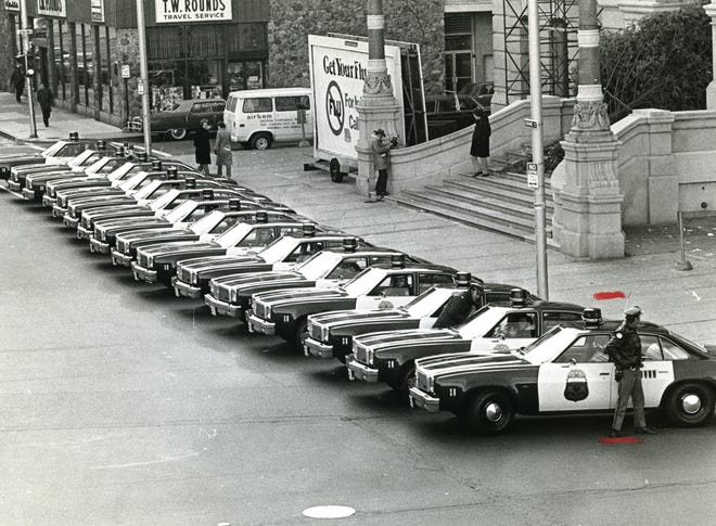 New police cars are lined up outside City Hall in Providence on a December morning in 1976. [The Providence Journal, file]