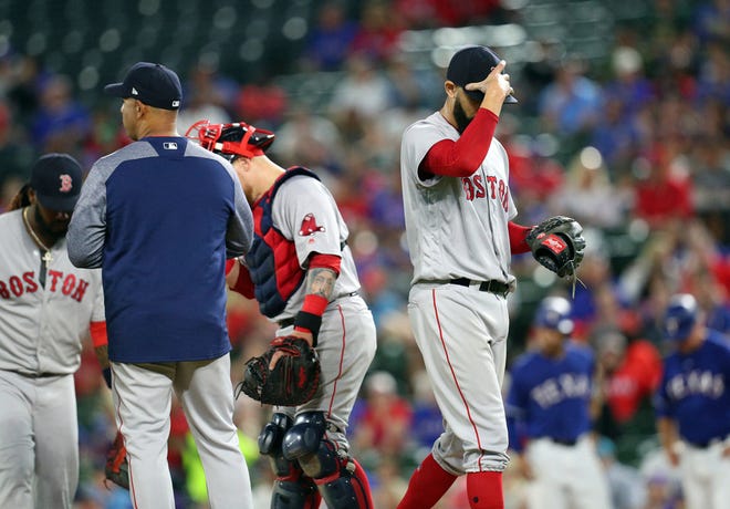 David Price heads to the dugout after getting the hook in the fourth inning.