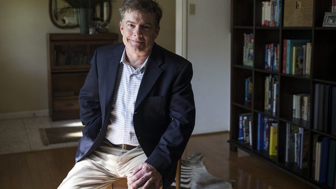 Administrative Law Judge Hunter Burkhalter was forced to resign his position “in lieu of termination” by his boss after he ruled on a case revolving around allegations of sexual misconduct by a physician. Burkhalter, who was photographed at his home in Austin, Texas, on Wednesday, April 18, 2018, hopes to return to his role with the State Office of Administrative Hear­ings. NICK WAGNER / AMERICAN-STATESMAN