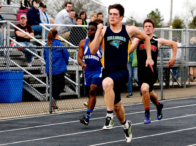 Hillsdale's Trace Stiltner sprints to the finish of the 100 at the Bob Valentine Invitational, held on Stiltner's home track. Stiltner also won the 200 and ran the anchor leg on two second-place relays.