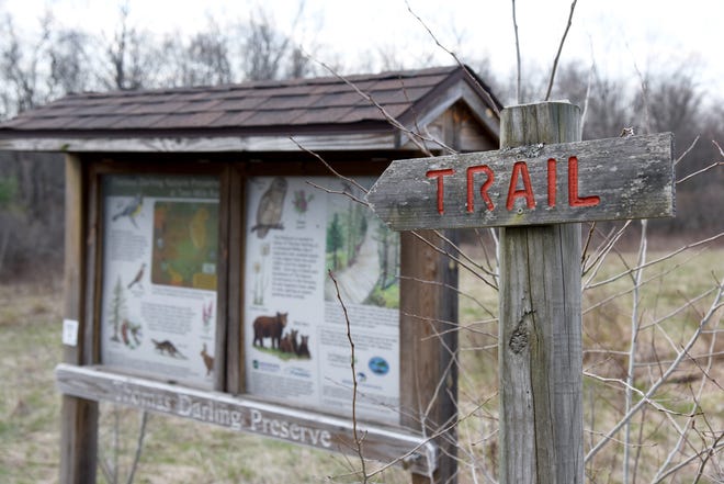 A sign marks the beginning of the trail at the Thomas Darling Preserve in Blakeslee. The preserve just received a crucial 10-acre addition of property that abuts the loop trail on each side. [PATRICK CAMPBELL/POCONO RECORD]