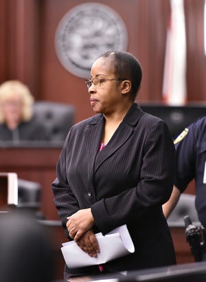 Gloria Williams enters the courtroom for a sentencing hearing Thursday at the Duval County Courthouse in Jacksonville. [WILL DICKEY/AP]