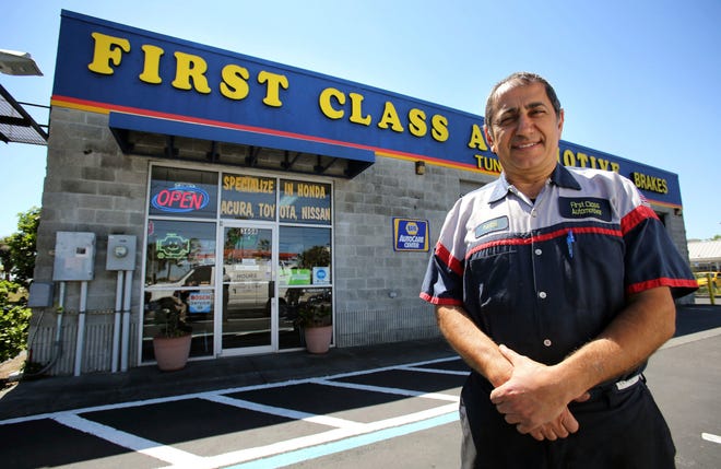 Automotive shop owner Nabil Armaly has owned his Orlando business for 15 years. [Joe Burbank/Orlando Sentinel via AP]