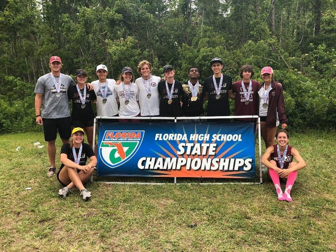 Members of the Niceville track and field team pose with their medals at the state championships in Jacksonville. The Eagles brought home medals in 12 events. [JAIME LAFOLLETTE/CONTRIBUTED PHOTO]